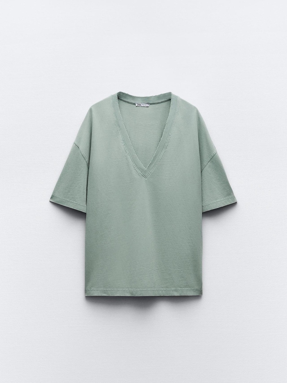 WASHED EFFECT T-SHIRT WITH V-NECK COLLAR